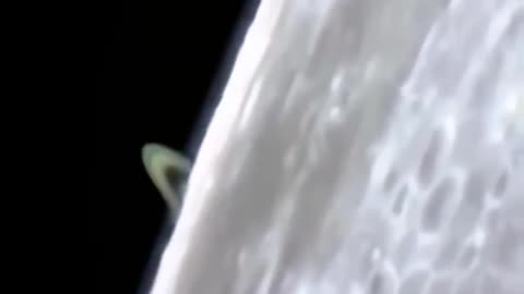 Incredible footage of Saturn rising from behind the Moon