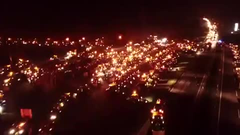 Germans Protesting the Vaccine Passports Block Entry Points to and from Berlin with Tractors