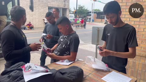 Migrants opening up their brand new FREE cell phones paid for by YOUR tax dollars😠😡😒