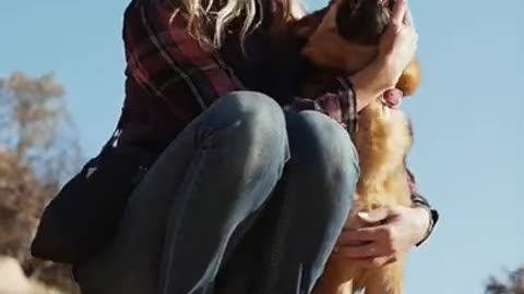 8.A Woman Kissing a Dog