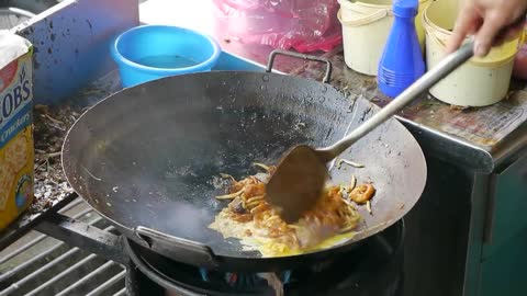Char Kway Teow, cooked by a hawker on Mundri St, Georgetown Penang