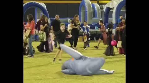 Guy in Shark Costume gets Knocked Out!