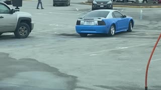 Guy With Sagging Pants Paints in Ride in Parking Lot