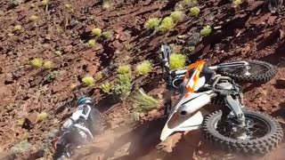 Collab copyright protection - orange white dirt bike up hill fail