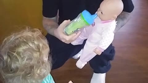 1 year old feeding doll so cute