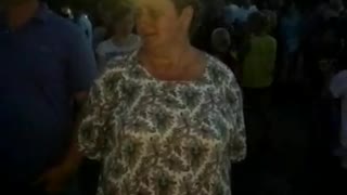 Girl dancing in the street. Holiday. Very nice and rhythmically. It's worth a look.