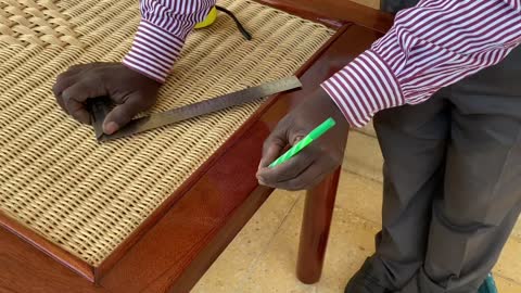 Hand engraving on rattan table