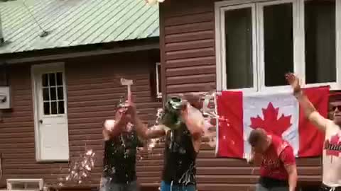 Four canadien bros open mini kegs with hatchet and chug beer