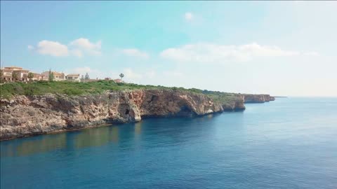 aerial landscape of the beautiful bay of cala mandia with a wonderful turquoise sea porto