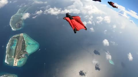 Amazing Wingsuit Flying over Island