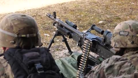 U.S. Army Paratrooper assigned to the 173rd Airborne Brigade, M240B machine gun training