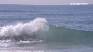 Guy surfboard gets knocked out into air by huge wave