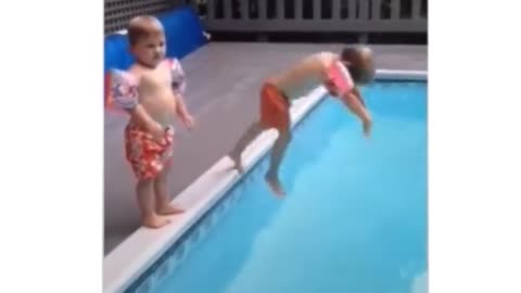 Baby running mother learns to dive