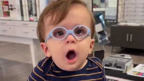Baby boy sees his mother clearly for the first time wearing his new glasses, smile says it all 🥰