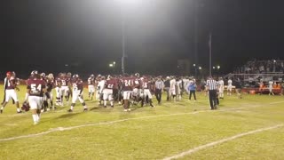 Football brawl: Players fight after a team flew a 'back the blue' flag