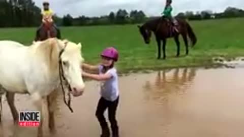 Watch Pony Dunk Little Girl Rider Into Mud and Roll Around