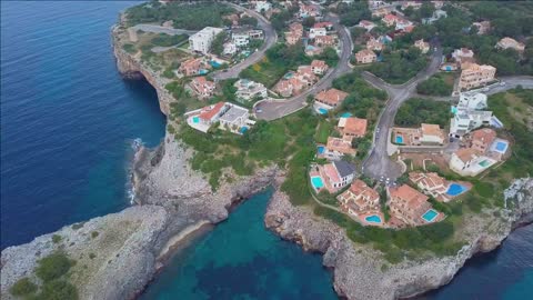 aerial view landscape of the beautiful bay of cala anguila with a wonderful turquoise sea porto