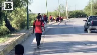 USA – Illegal aliens stroll into Eagle Pass, Texas, from Piedras Negras, Mexico.