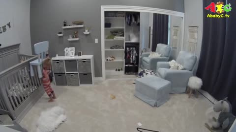 Toddler helps baby brother out of the crib (ADORABLE )