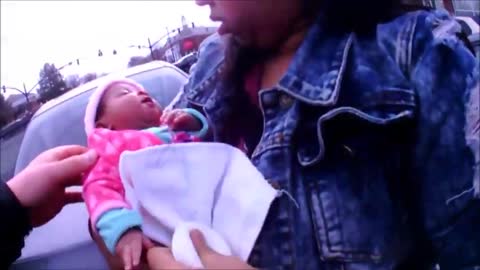 Police Officers Save Choking Baby Amidst A Busy Intersection