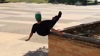 Collab copyright protection - green hat skateboard falls big ledge