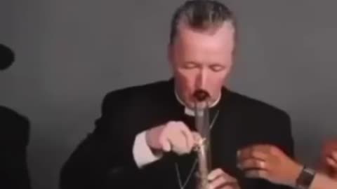 Priest smoking bang