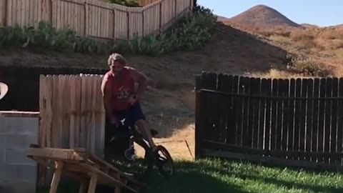 Collab copyright protection - red shirt dad bike ramp faceplant