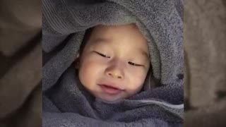 Adorable baby cracks himself up after passing gas