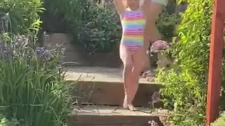 Dad Joins Daughter in Gymnastics Routine