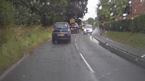 Driver Splashes Pedestrian