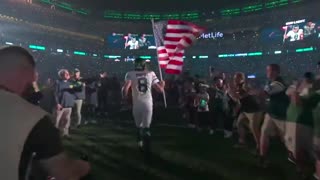 Aaron Rodgers Carries Our Flag Onto The Field In POWERFUL 9/11 Moment