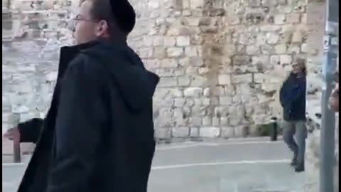 German priest Father Nicodemus insulted and spat on by Jews while touring in Jerusalem..