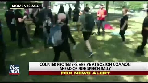 Aug 19 2017 Boston free speech rally 1.2 Woman waving American flag is hit, dragged by Antifa