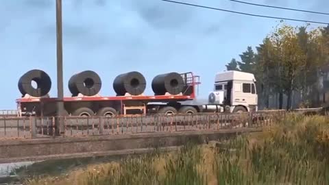 The truck crosses the river in a strange and funny way
