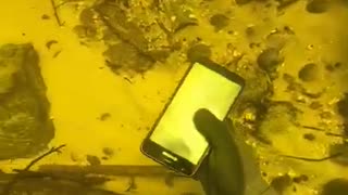 FOUND PHONE IN RIVER