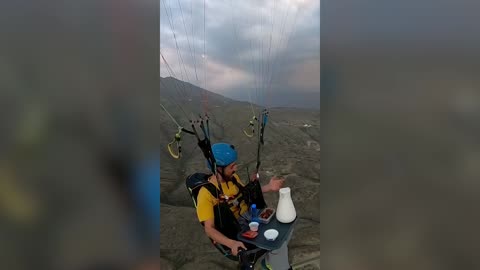MILE HIGH GRUB: Paraglider Breaks Ramadan Fast In Mid-Air