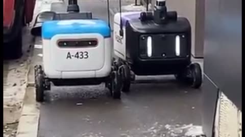 Stand and deliver! Delivery robots have intense showdown on narrow sidewalk