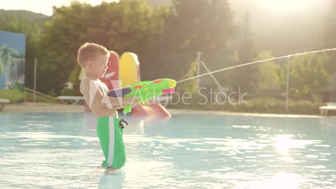 Outdoor Children Playing Water Fights Even The Netflix Squirt