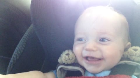 Baby hilariously laughs at older brother