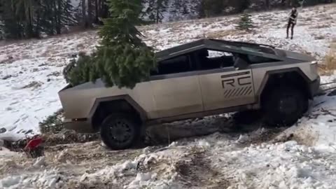 Tesla Cybertruck Gets Stuck in Snow and is Rescued by Ford Truck