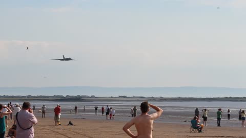 Vulcan Bomber Stuns Beach-Goers With A Low Fly By