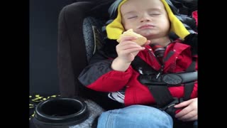 Kid falls asleep while eating ice cream