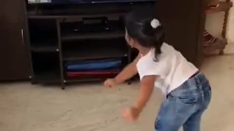 Toddler smashes into tv while dancing