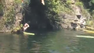 Girl faceplants jumping into water