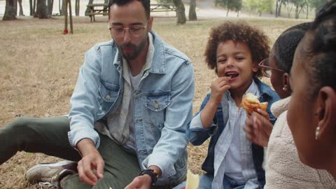 Family Having Picnic Together