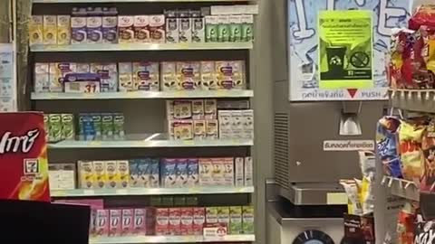 A Giant Lizard in a supermarket in search of foods.