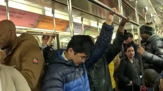 Guys sing and clap we will rock you by queen on subway train