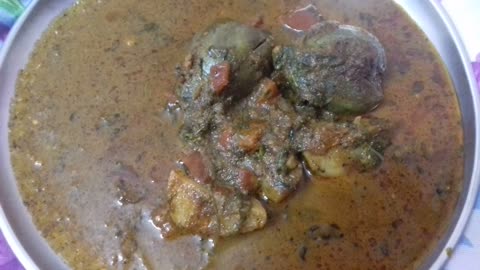 I made very spicy brinjal potato curry with rice and plain Roti very delicious