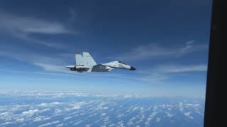 Chinese J-11 intercepts U.S. Air Force RC-135