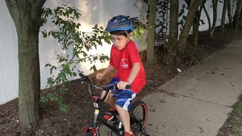 Spencer riding his bike VID_20180808_185815